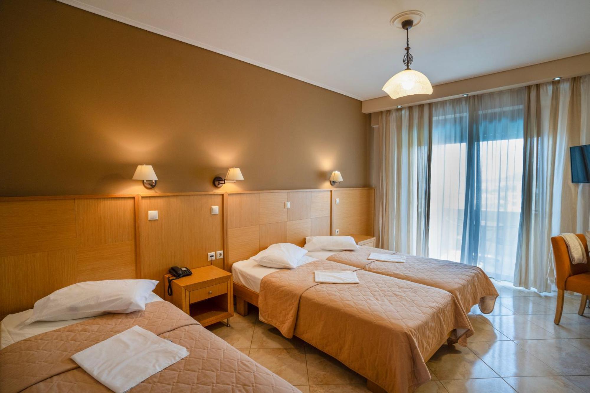 Evia Hotel & Suites Marmari  Exterior photo